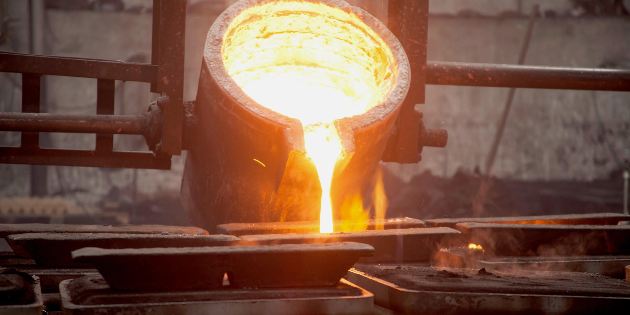 Molten Iron pouring into a cast.